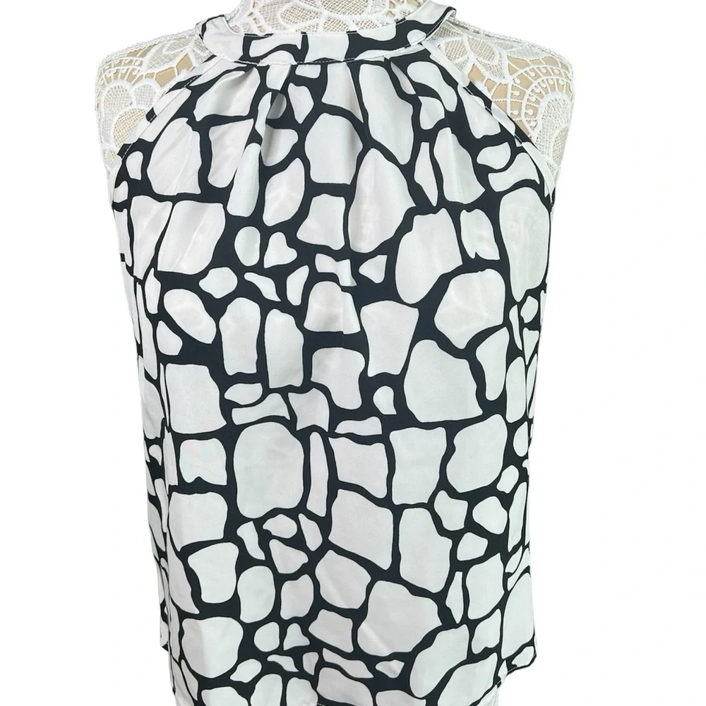 Women pants suits Allover print halter elegant Set.Sleeveless size Medium.